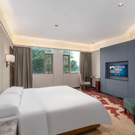 Mizparton Hotel South Qianjin Road Heshan  エクステリア 写真