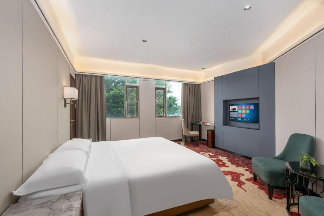 Mizparton Hotel South Qianjin Road Heshan  エクステリア 写真